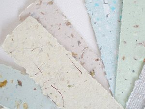 Small pouch of mixed handmade paper off-cut strips / pieces for torn paper art / mixed media