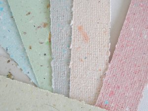Small pouch of mixed handmade paper off-cut strips / pieces for torn paper art / mixed media