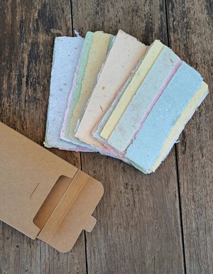 Small pouch of mixed handmade paper off-cut strips / pieces for torn paper art / mixed media