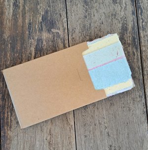 Small pouch of mixed handmade paper off-cut strips / pieces for torn paper art / mixed media