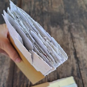 Small pouch of mixed handmade paper off-cut strips / pieces for torn paper art / mixed media