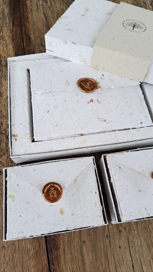Stationery Set. Gift boxed handmade recycled paper writing sheets and envelopes with wax seals. 10 sheets, 5 envelopes, wax seals