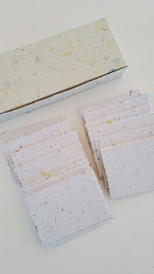 50 Pieces of thick handmade recycled card 4x3 Inch in Gift Box. Cream in colour, deckle and rough torn edges with saffron flecks