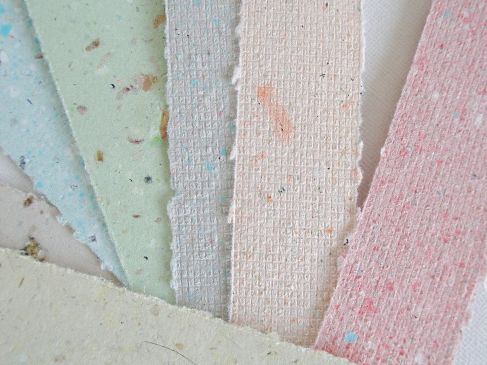 Small pouch of mixed handmade paper off-cut strips / pieces for torn paper art / mixed media