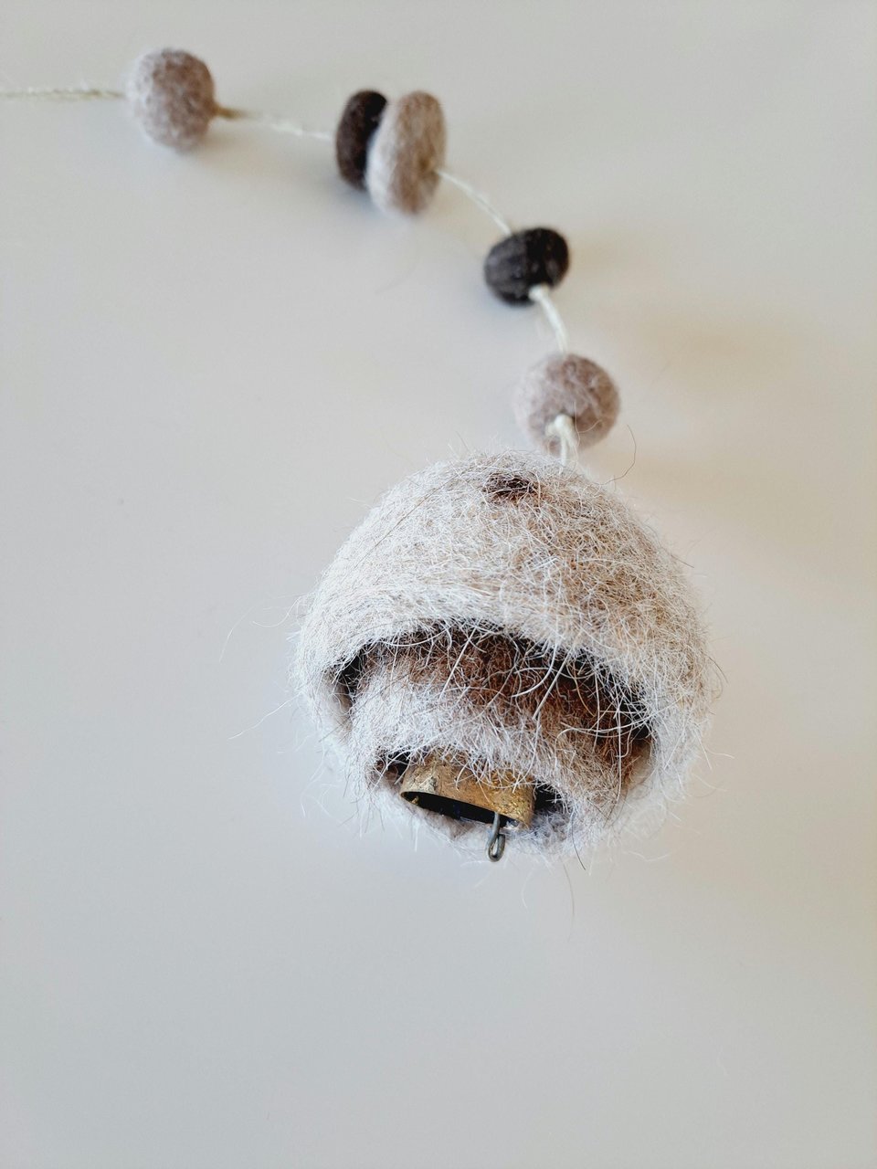 Boho Bell made with llama fiber for nursery. Fuzzy Natural Toned Decor for Rustic Farmhouse, Room for Children.