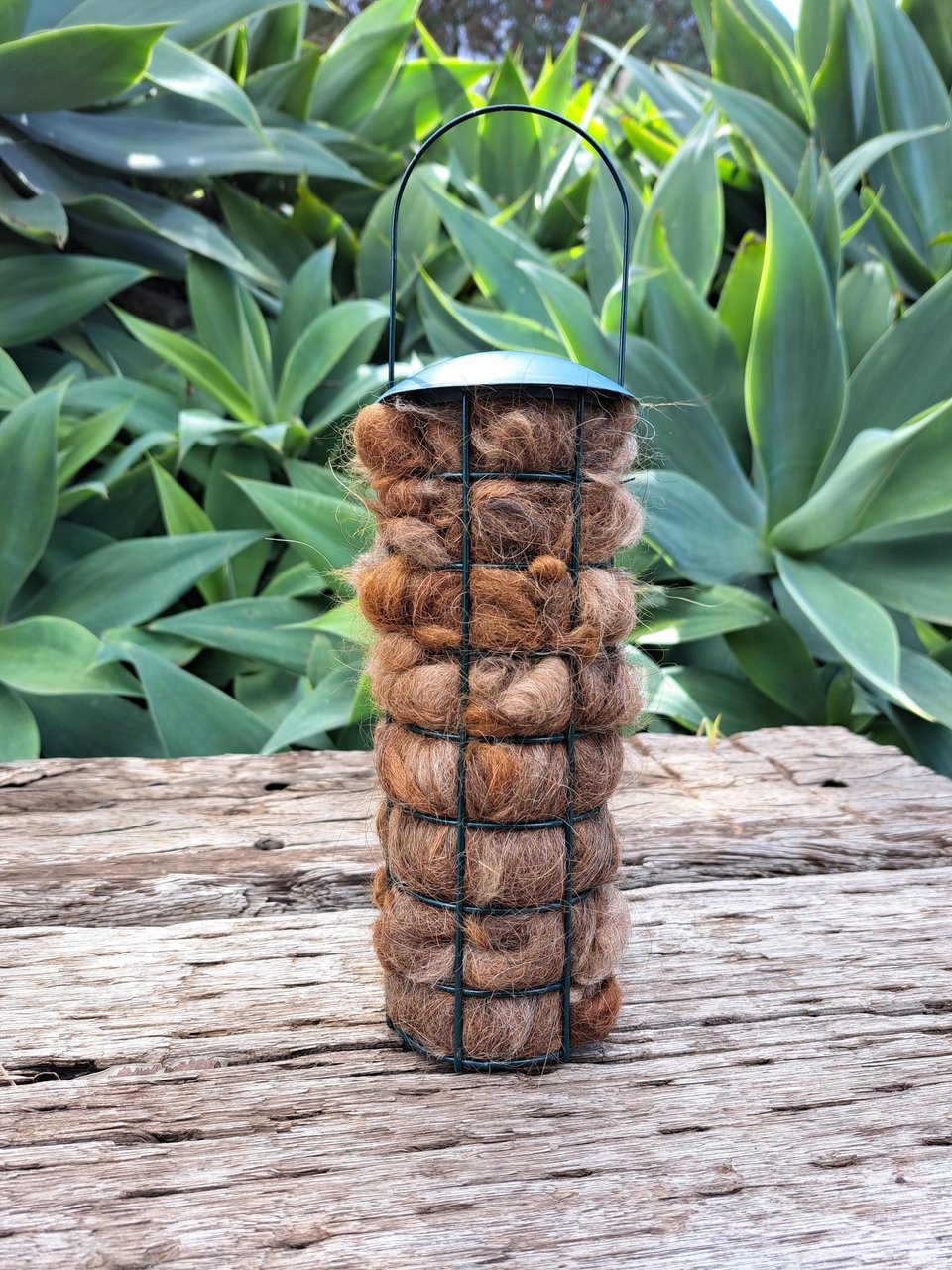 Bird Nester. Llama Fibre Nesting Material for backyard bird nests and birdhouses. SMALLER VERSION green metal hanging holder.