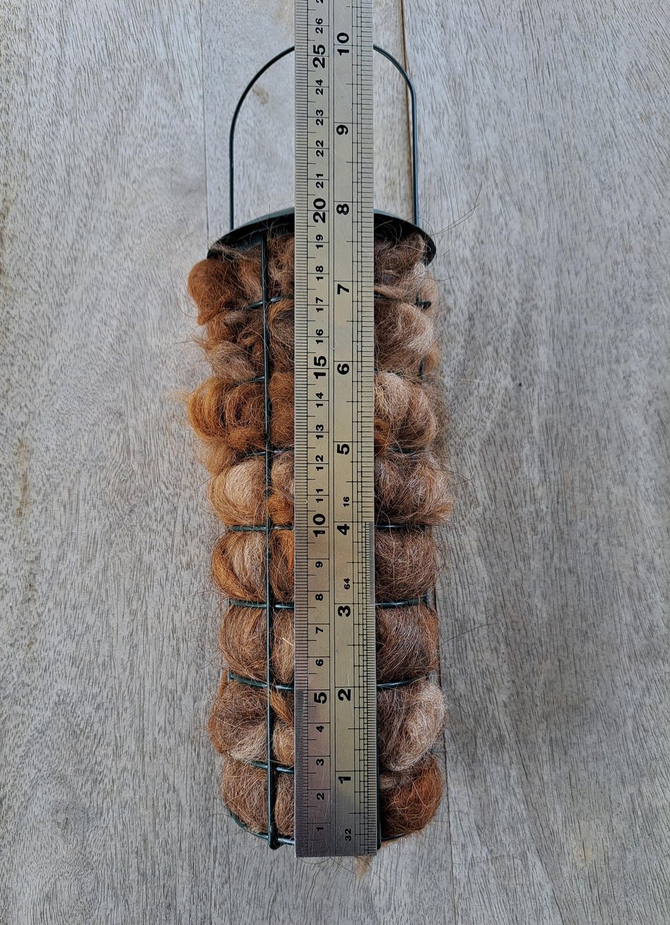 Bird Nester. Llama Fibre Nesting Material for backyard bird nests and birdhouses. SMALLER VERSION green metal hanging holder.