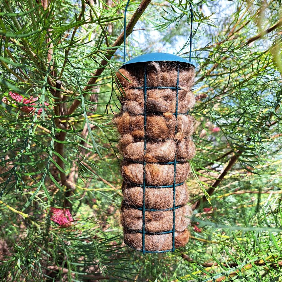 Bird Nester. Llama Fibre Nesting Material for backyard bird nests and birdhouses. SMALLER VERSION green metal hanging holder.