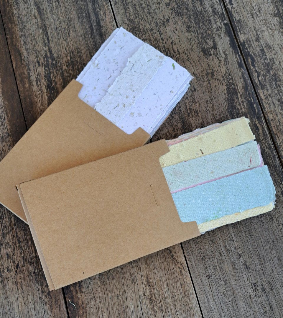 Small pouch of mixed handmade paper off-cut strips / pieces for torn paper art / mixed media