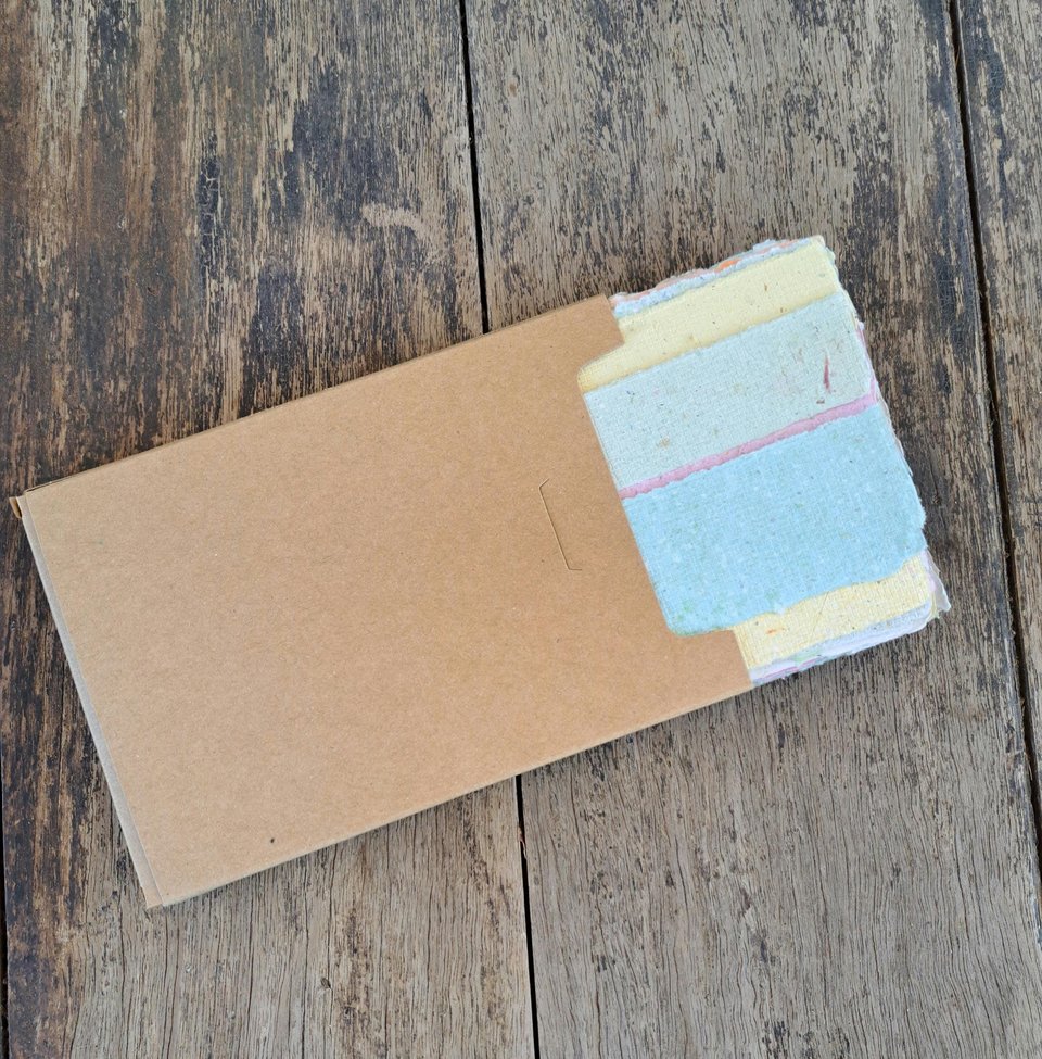Small pouch of mixed handmade paper off-cut strips / pieces for torn paper art / mixed media